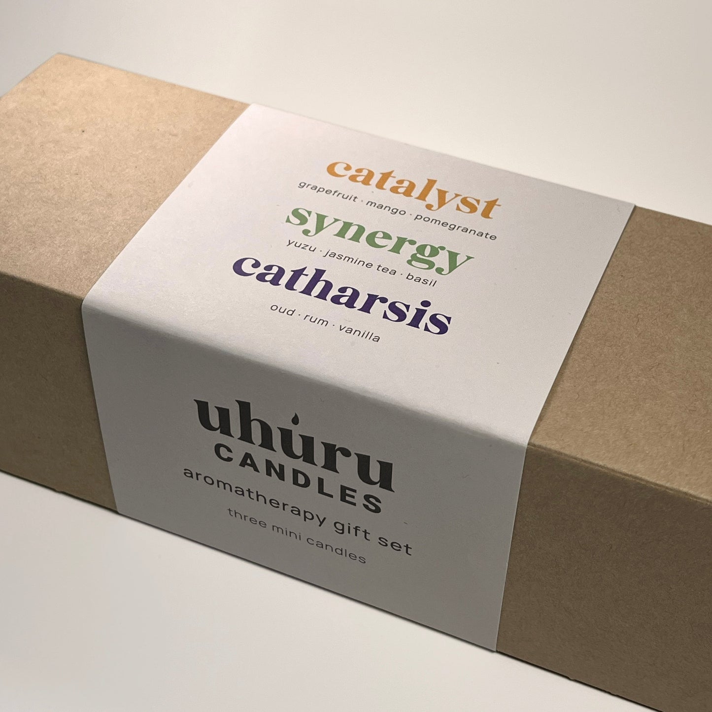 Uhuru Candles aromatherapy gift set packaging on a neutral background